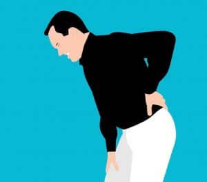 Man Holding Lower Back in Pain