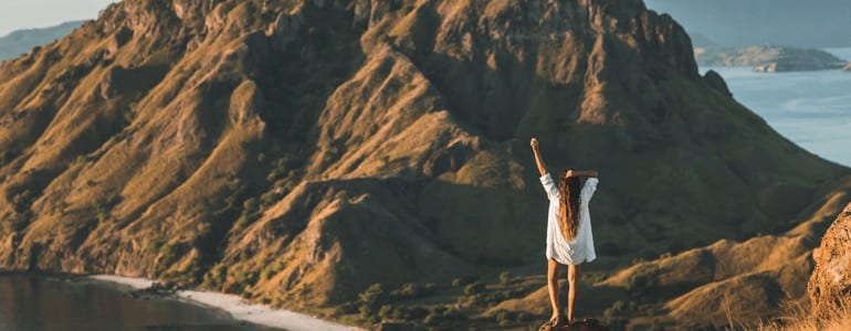 Woman Bare Foot on Cliff